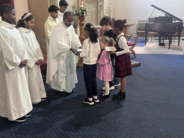 The Communion procession during Family Eucharist