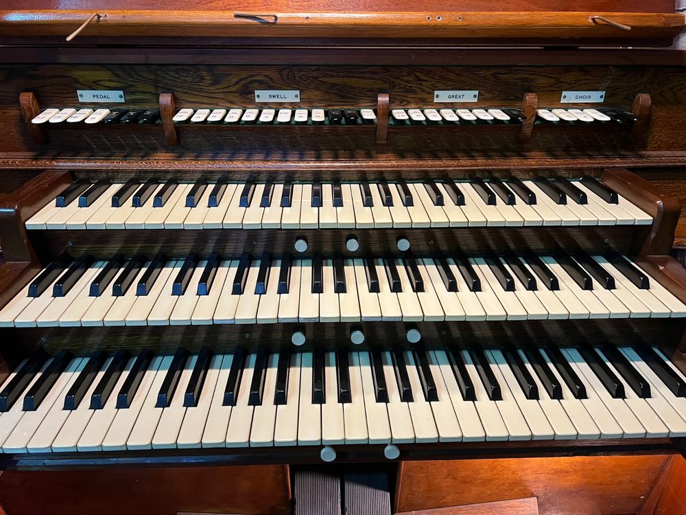 The organ console showing Pedal, Swell, Great and Choir manuals