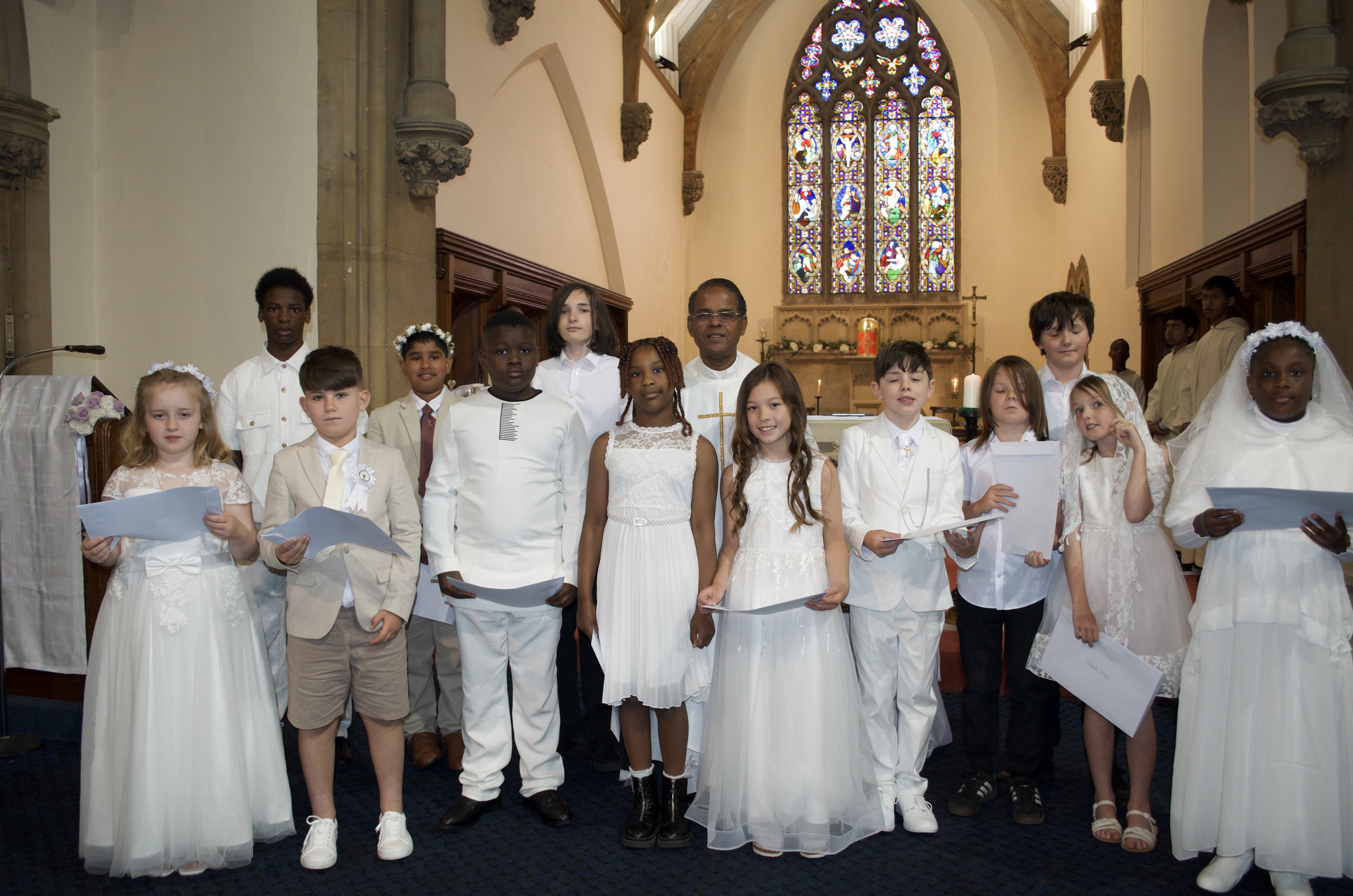 First Holy Communion children with Fr. Savi