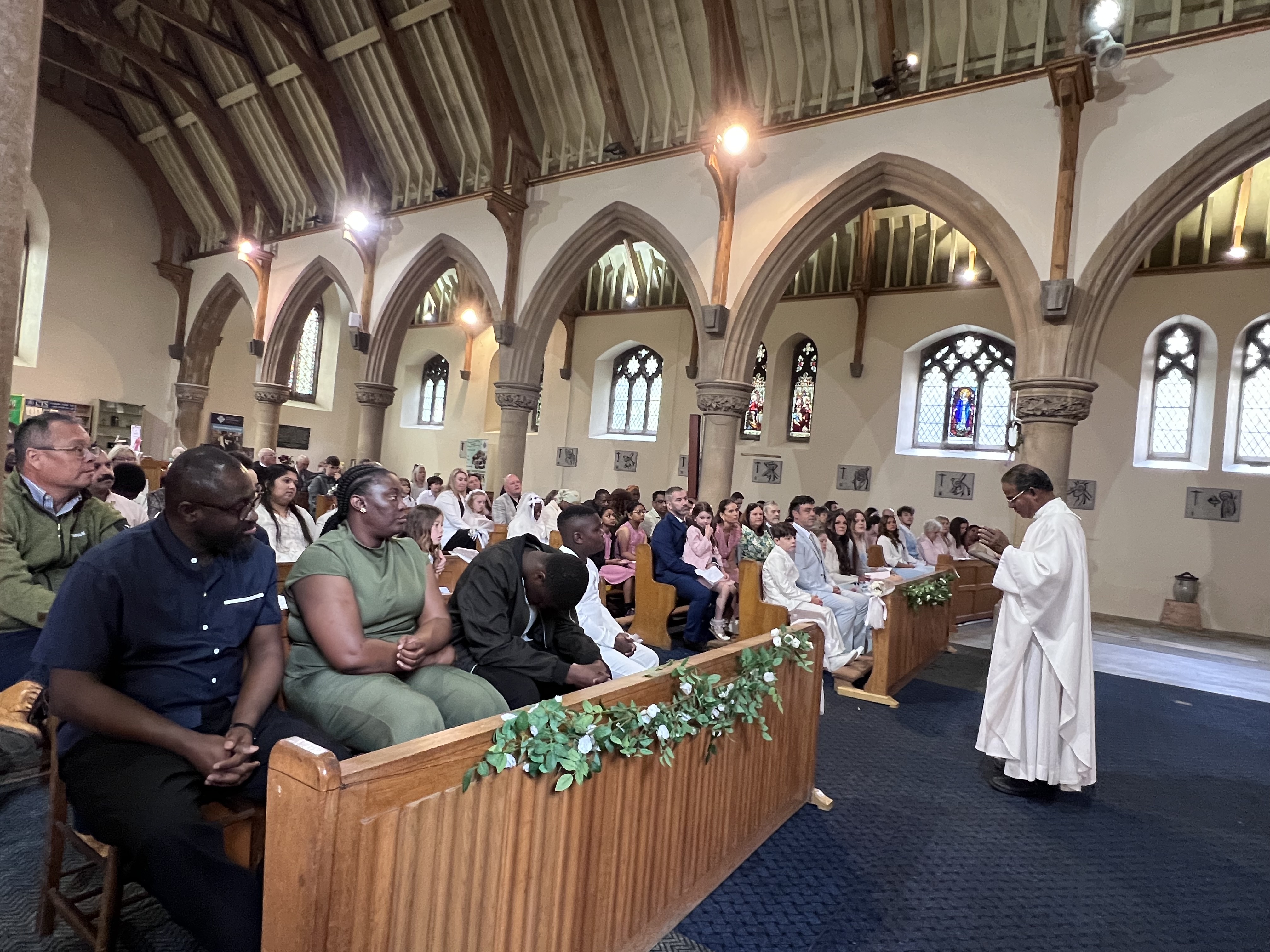 The congregation gathered for the First Holy Communion Mass
