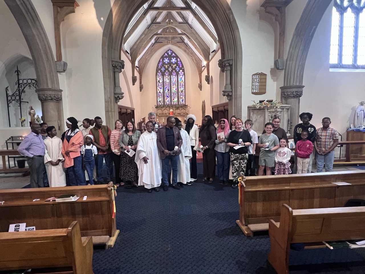 The congregation gathers for a group photo