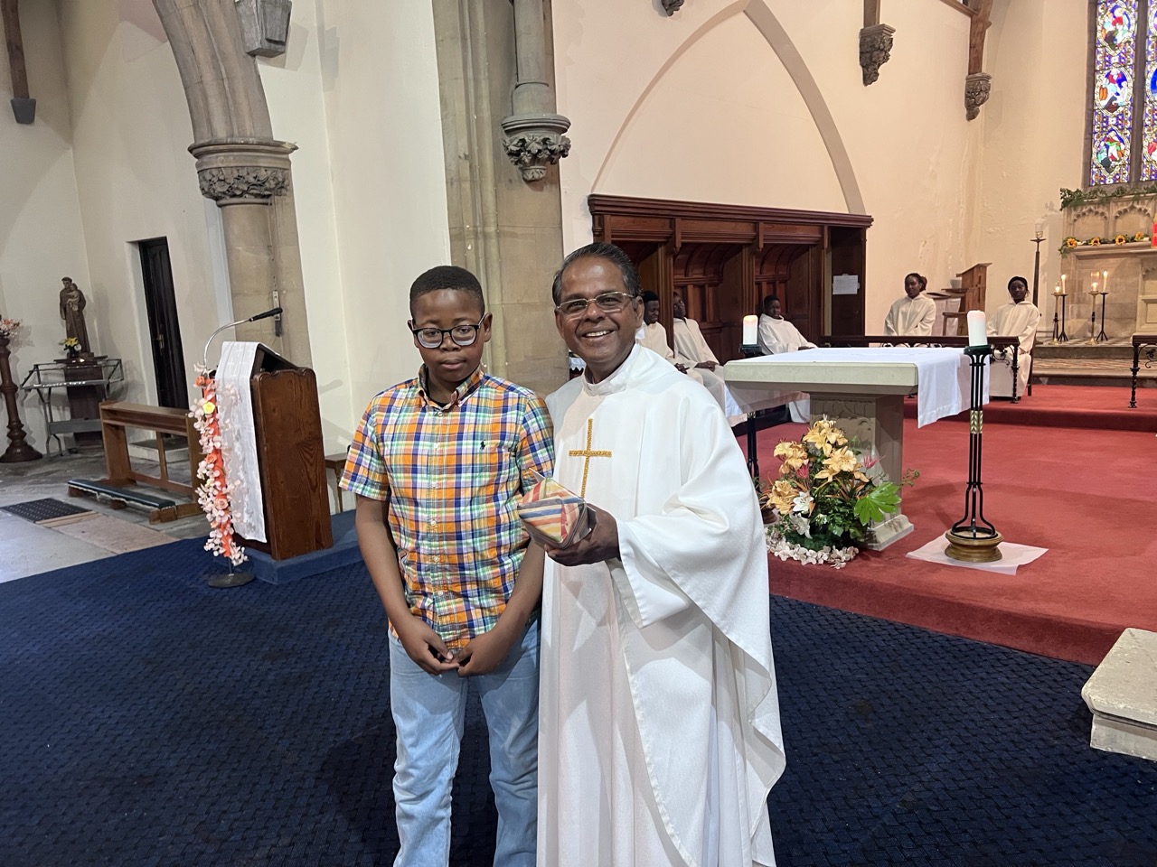 Fr. Savi with the birthday altar server